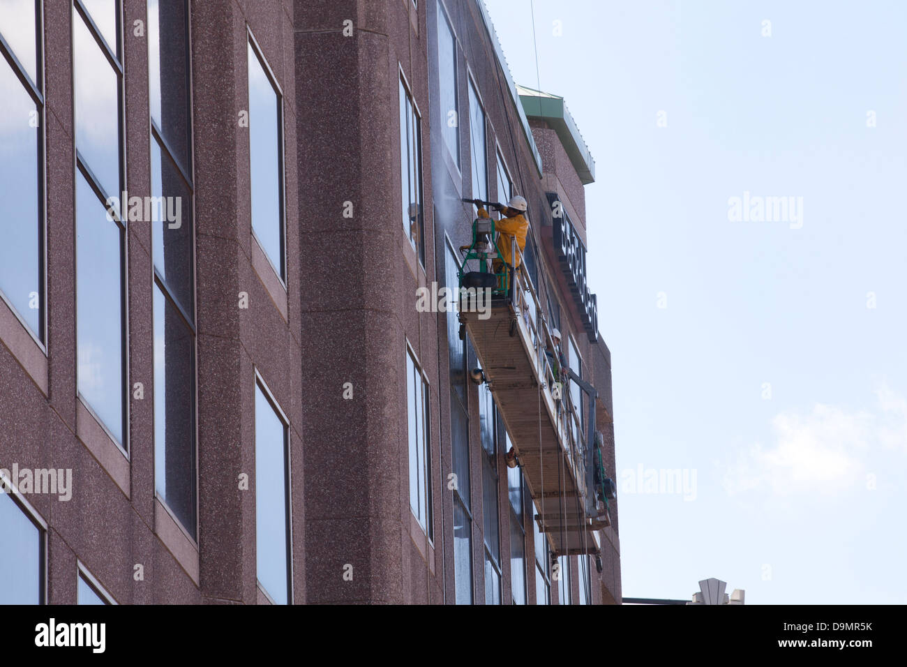 Uomini al lavoro su areale e piattaforma di lavoro - USA Foto Stock