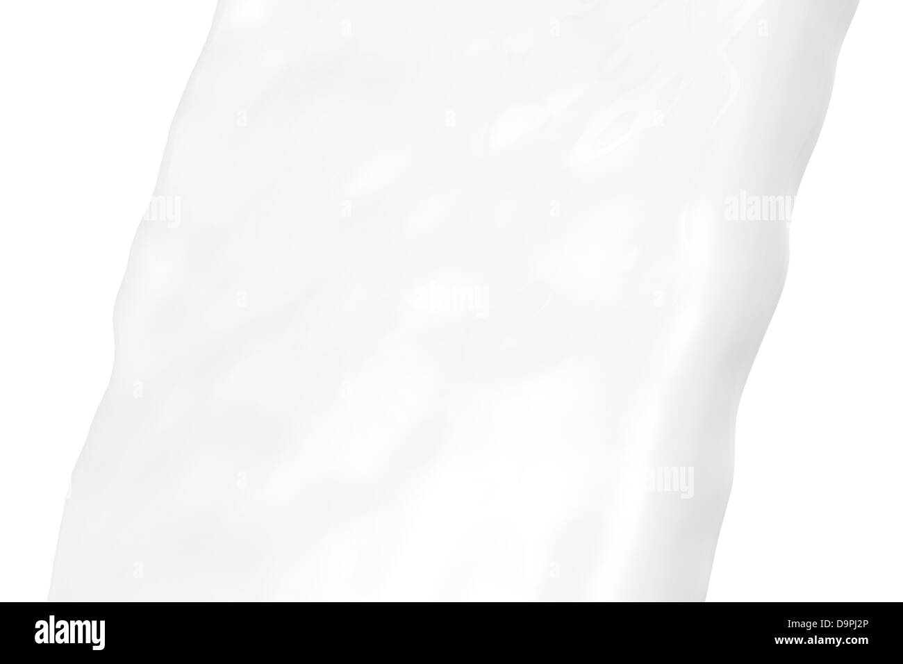 Vista ravvicinata di un flusso di latte fresco Foto Stock