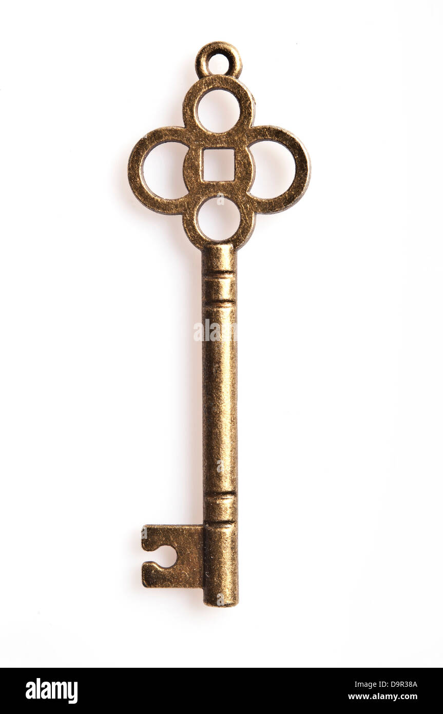 Ornato oro antico scheletro chiave, isolato Foto Stock