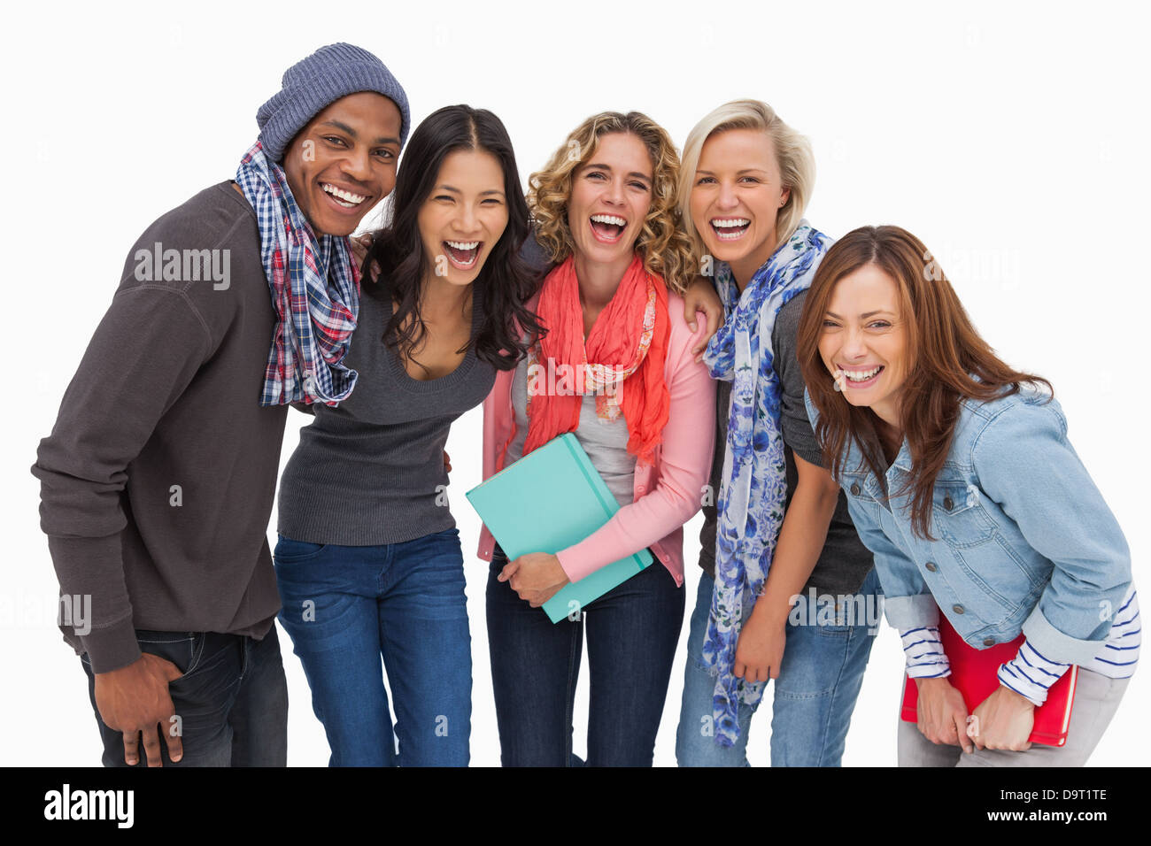 Gli studenti alla moda in una fila sorridente Foto Stock