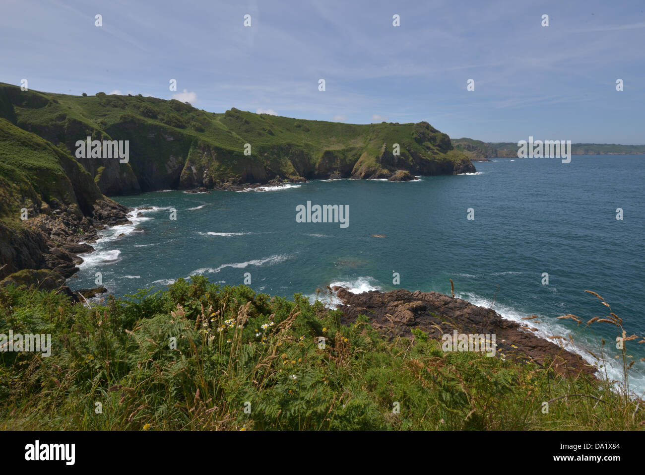 La linea di costa e la zona intorno al foro di diavoli in Jersey. Foto Stock