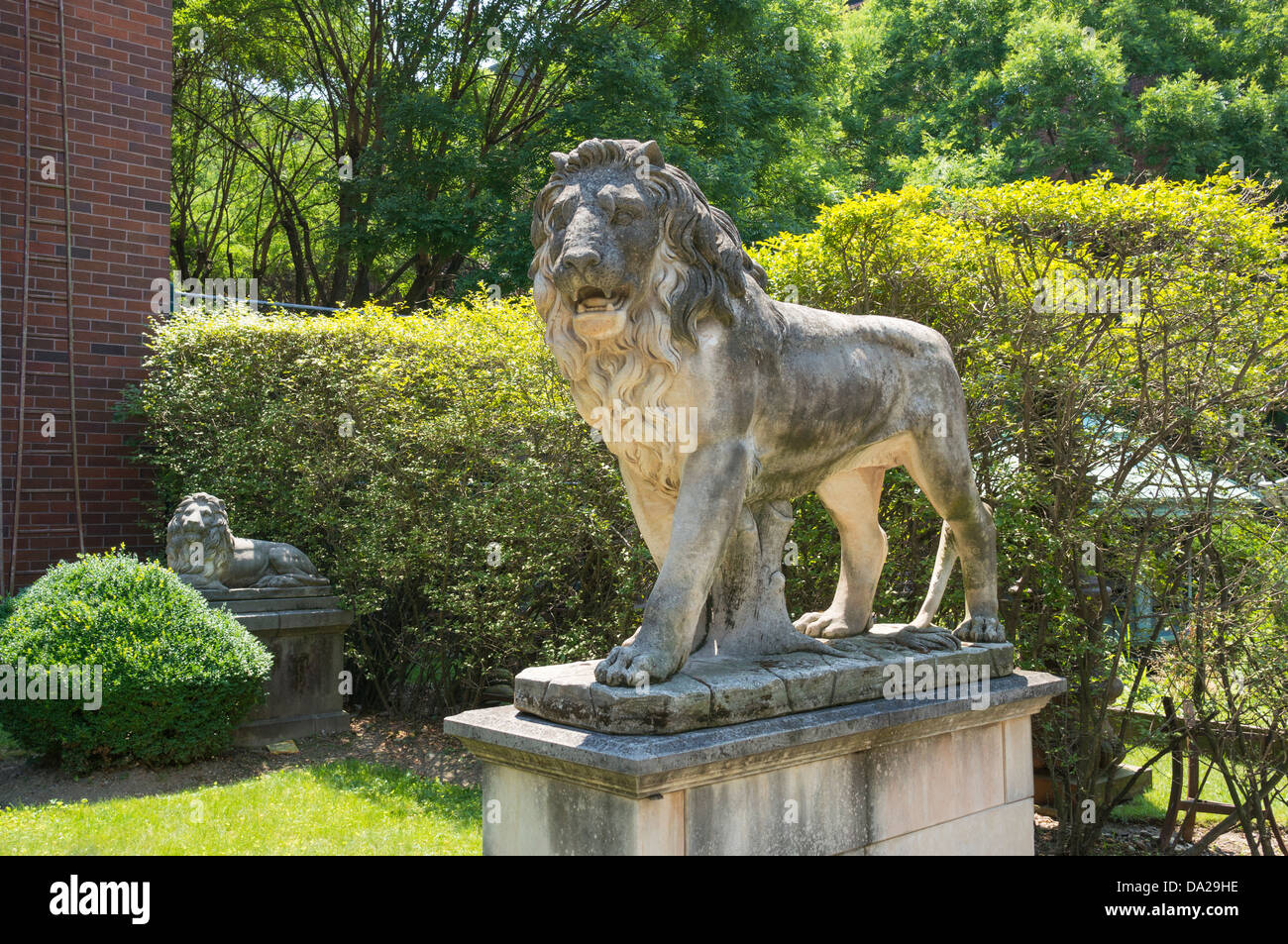 I Lions in un open-air Elizabeth Street Garden di Nolita nella città di New York Foto Stock