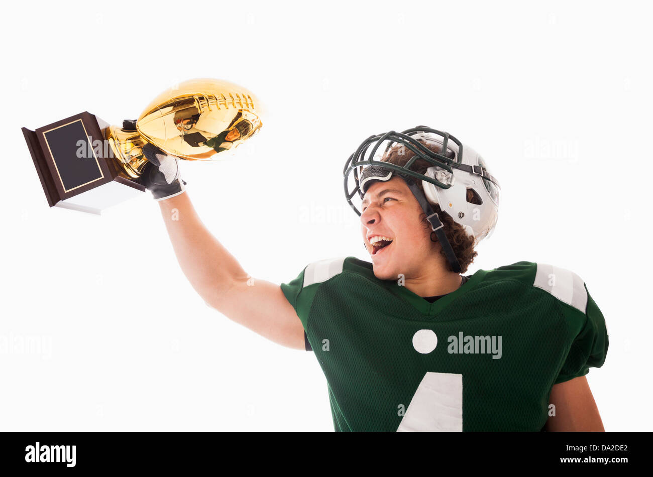 Ritratto di giocatore di football americano celebrando la vittoria Foto Stock