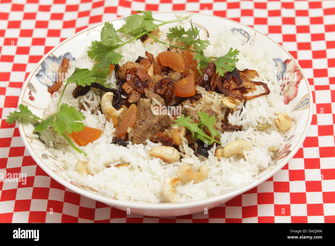 Una ciotola di fatti in casa a base di biryani-tipo fragrante curry di agnello Foto Stock