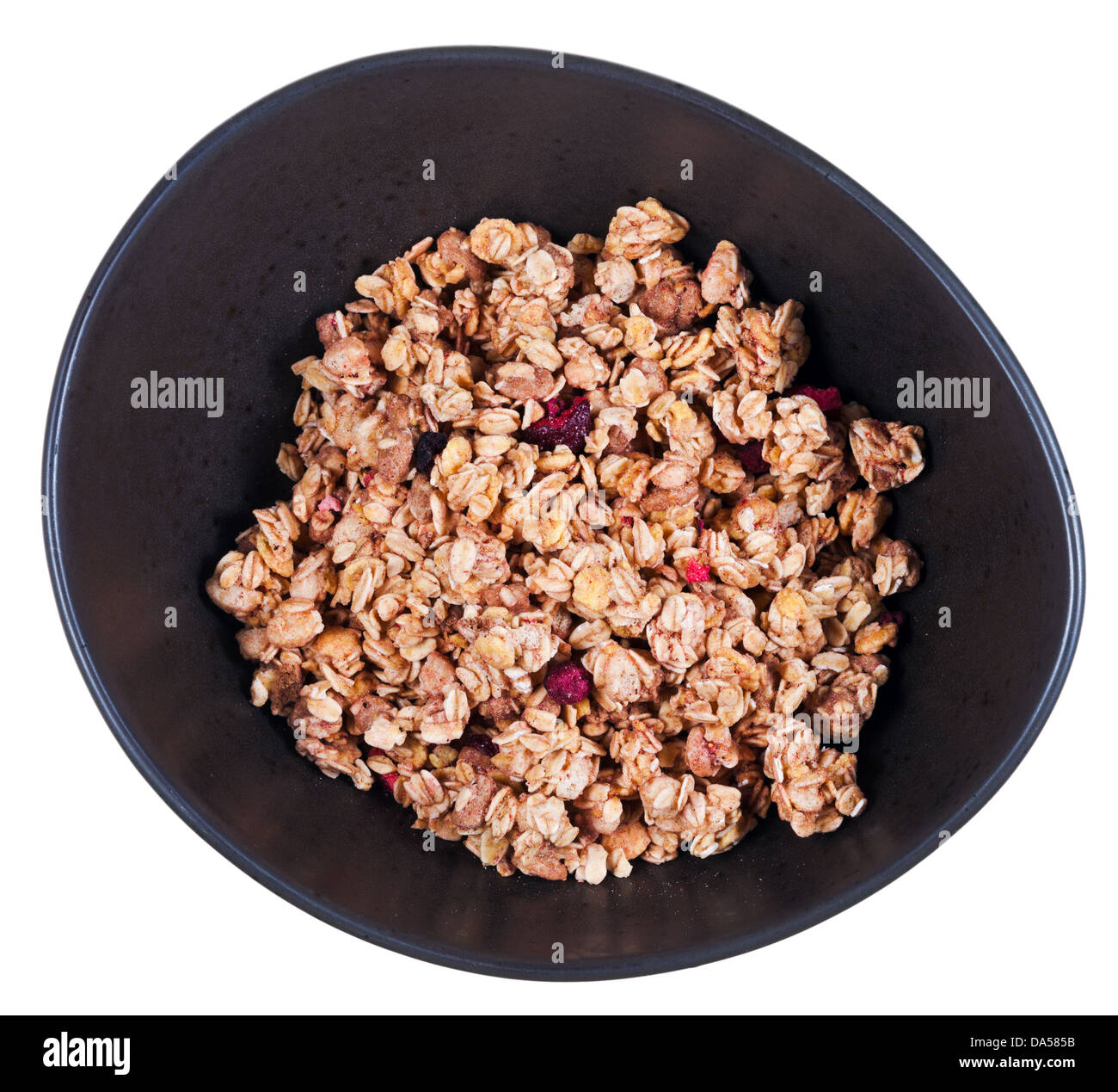 Vista superiore della secca muesli con frutti di bosco in vaso nero Foto Stock