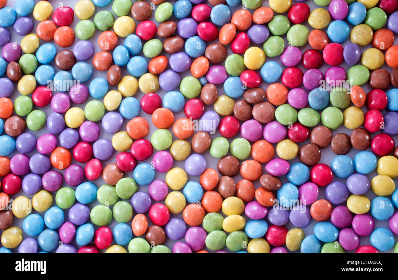 Molte colorate caramella di cioccolato in un studio Foto Stock