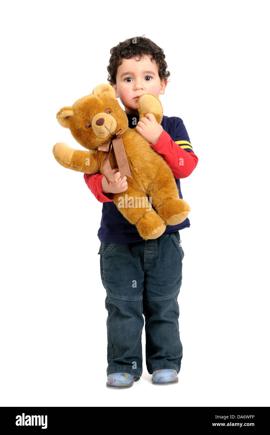 Ragazzo con Teddy bear isolato in bianco Foto Stock