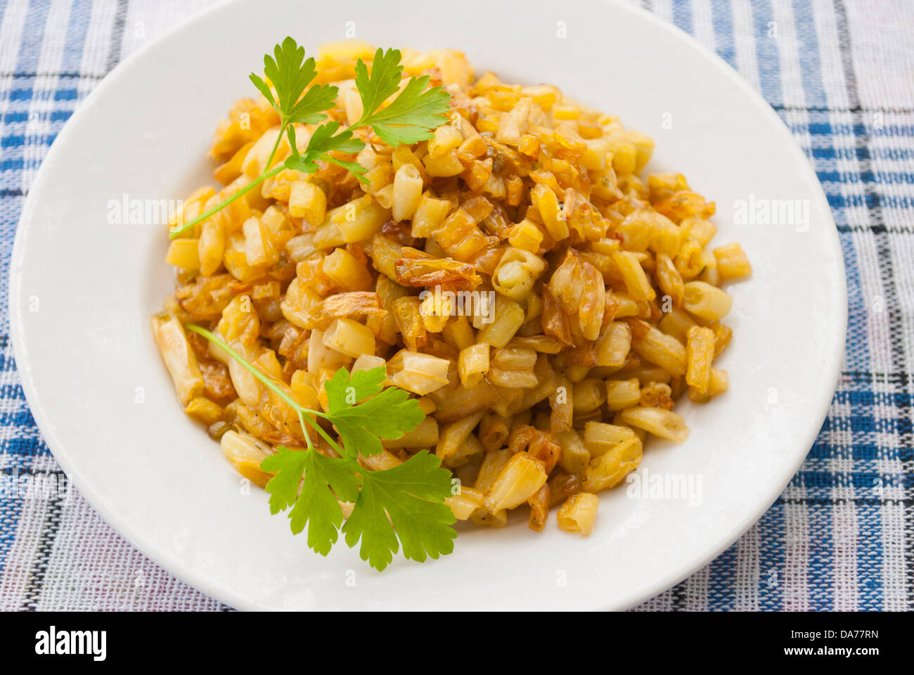 Asparagi Fritti fagioli in una piastra. Foto Stock