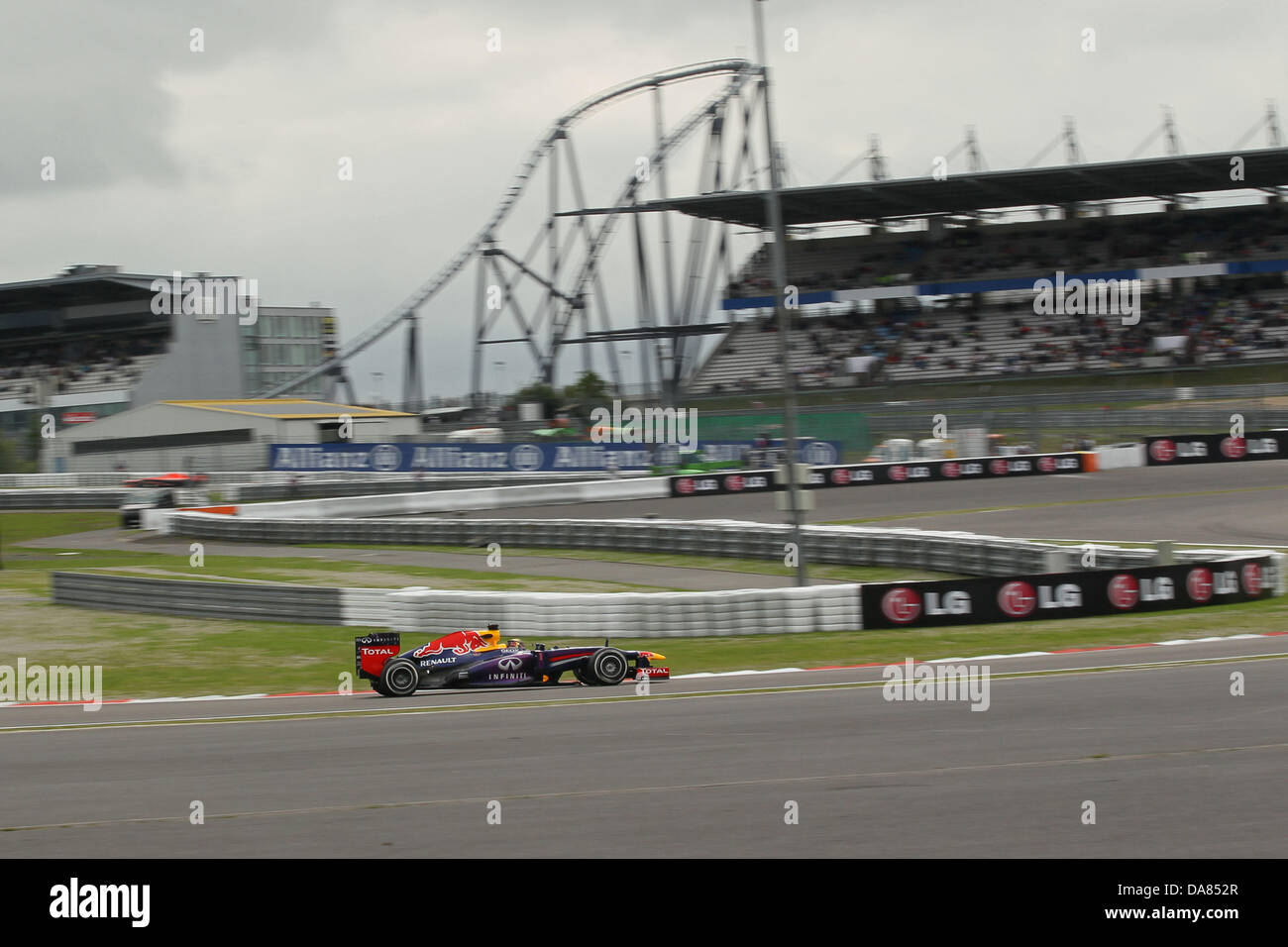 Nurburgring, Germania. Luglio 7th, 2013. Sebastian Vettel racing i suoi infiniti Red Bull Racing RB9 alla sua F1 a vincere a Nurnurgring Foto Stock