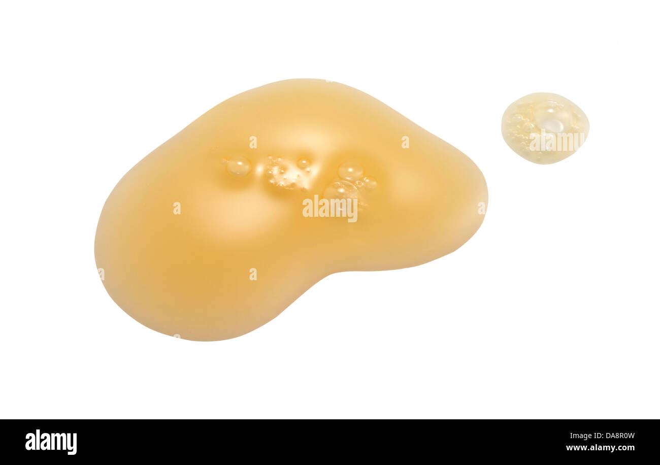 Giallo arancione crema gel olio tagliare su sfondo bianco Foto Stock