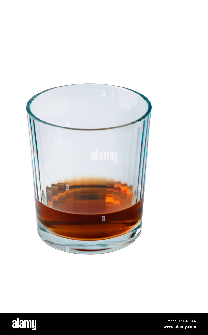 Il Bourbon whiskey rimanente in un bicchiere Foto Stock