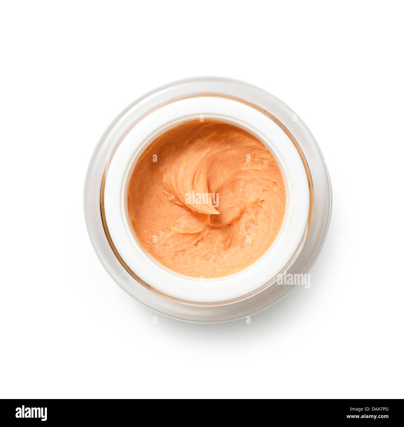 Giallo arancione crema olio pot ritagliato su uno sfondo bianco Foto Stock
