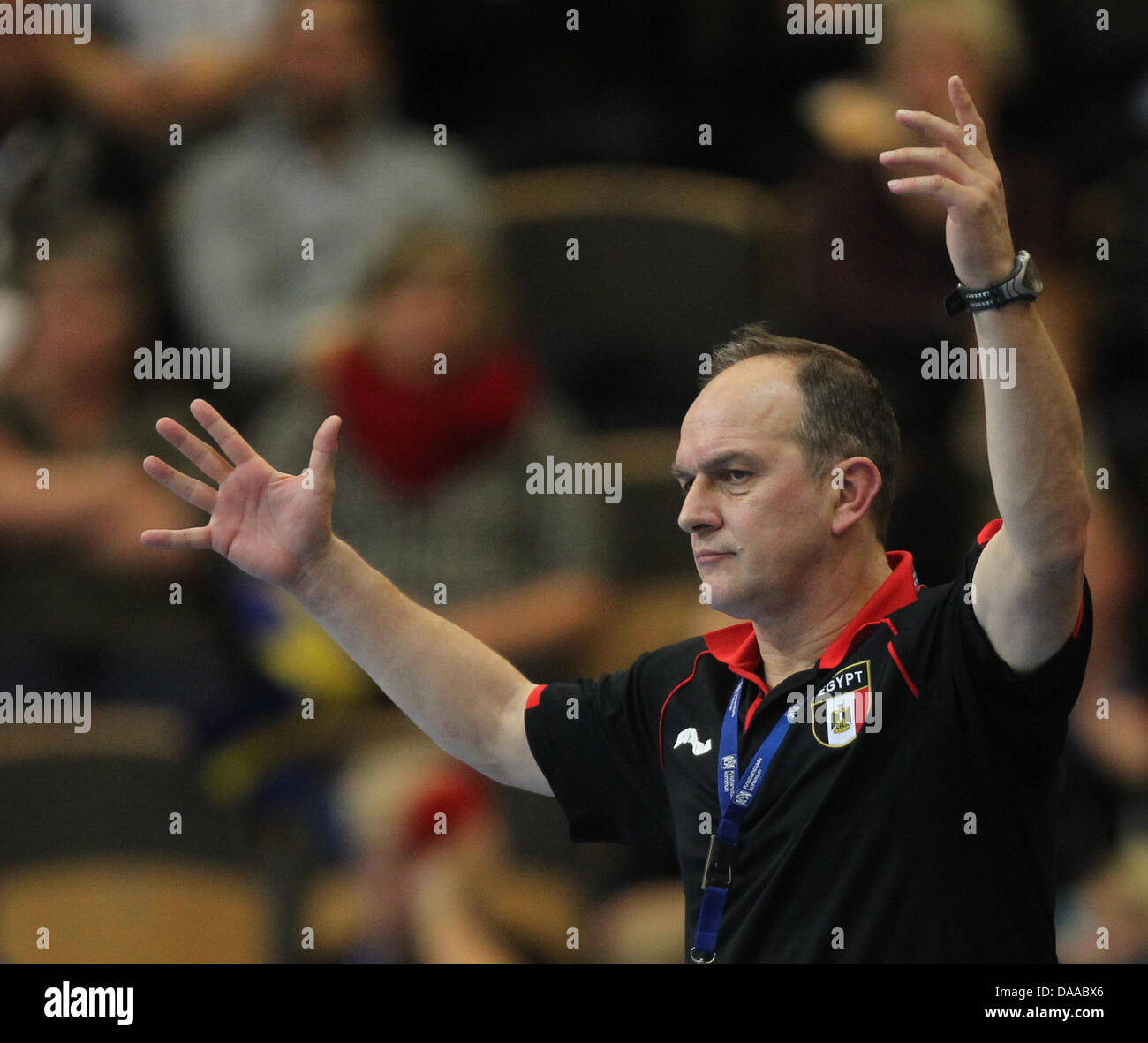 Joern-Uwe Lommel, pullman di Egitto, gesti durante la di Pallamano Campionato Mondiale turno preliminare Gruppo a corrispondere la Spagna contro l'Egitto in Kristianstad, Svezia, 19 gennaio 2011. Foto: Jens Wolf Foto Stock