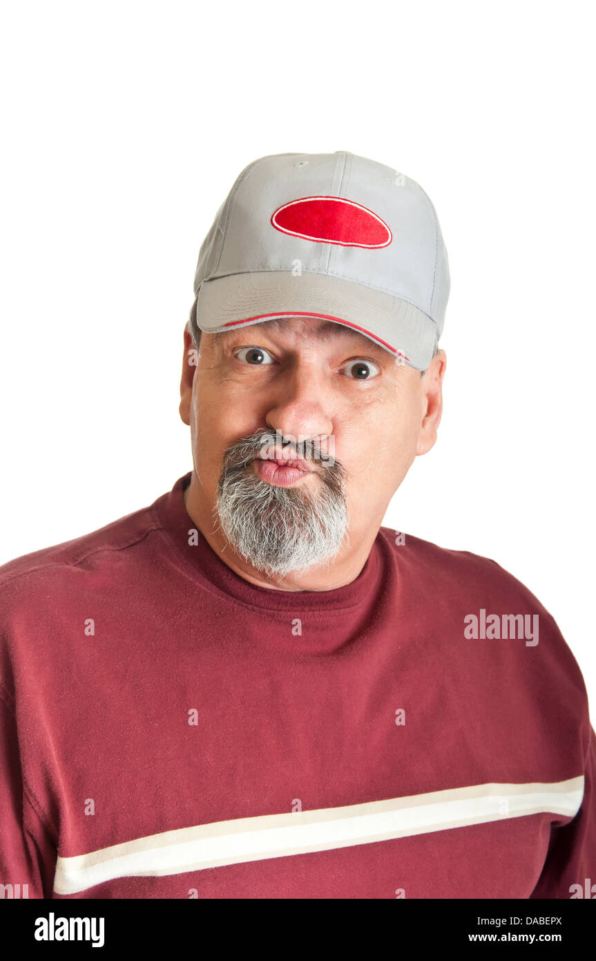 Maschio adulto con uno sguardo di incredulità sul suo volto come egli ascolta ancora un altro racconto alto da un amico. Foto Stock