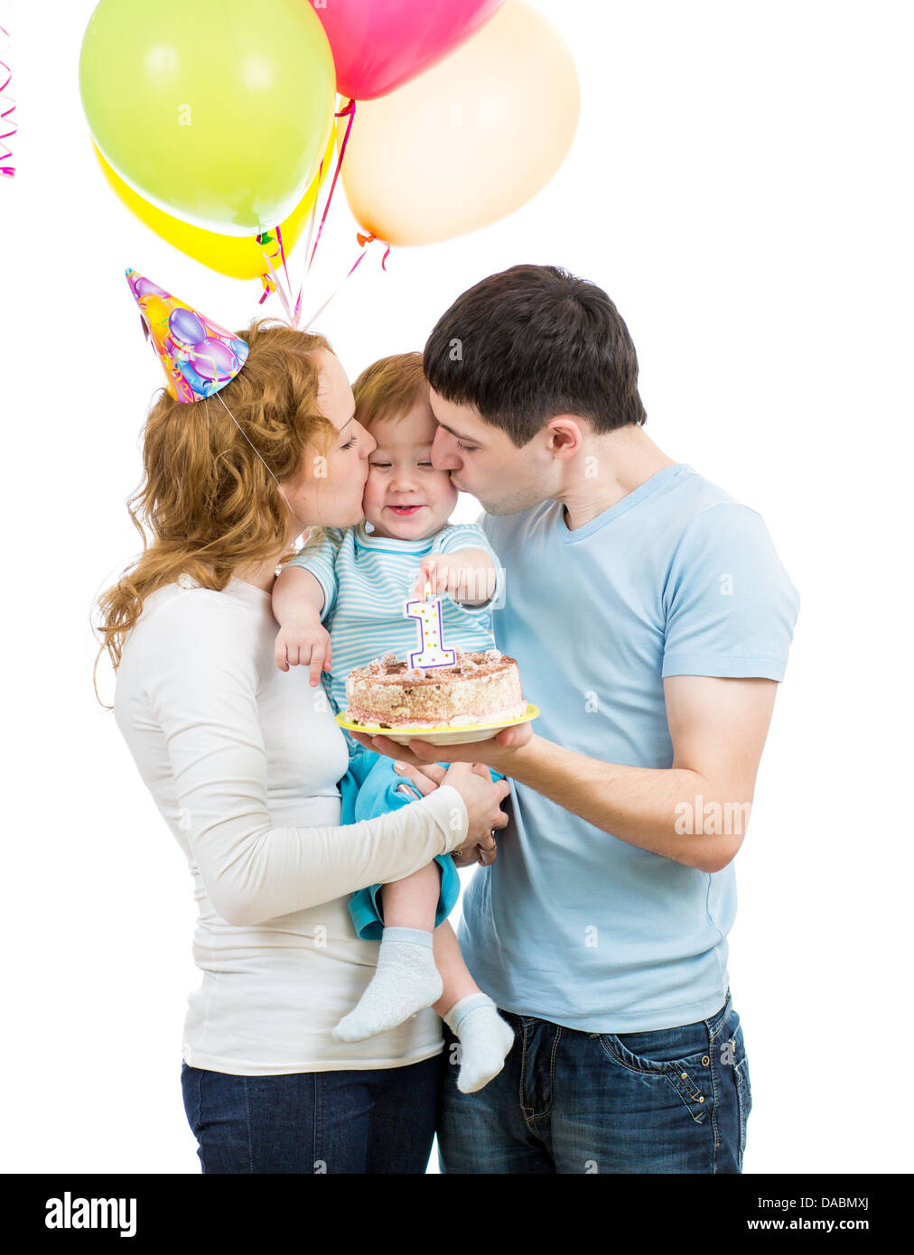 Giovane famiglia celebrando primo compleanno per bambini Foto Stock