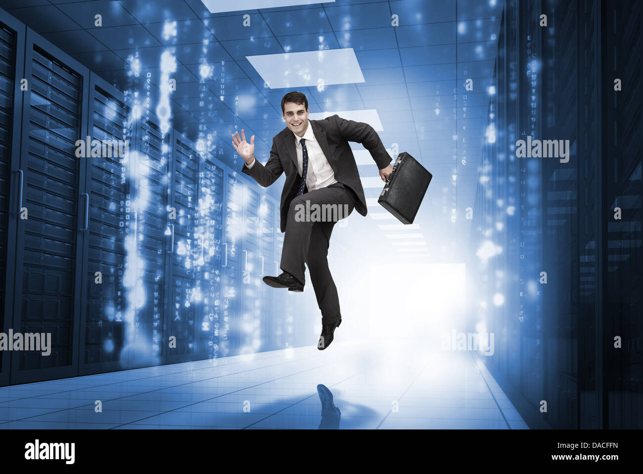 Businessman jumping in un corridoio Foto Stock