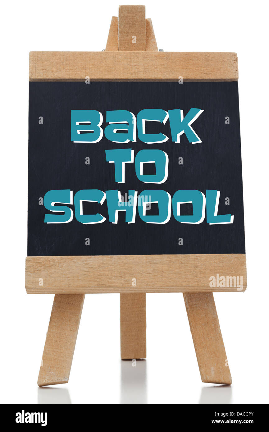 Si torna a scuola scritto in blu sulla lavagna Foto Stock