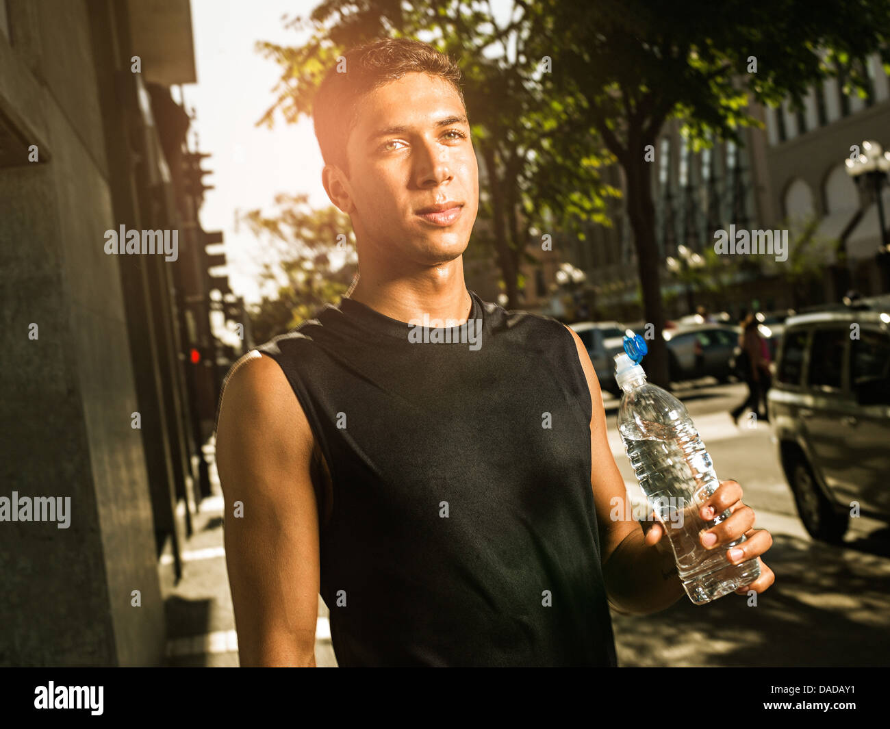 Runner con una bottiglia d'acqua Foto Stock