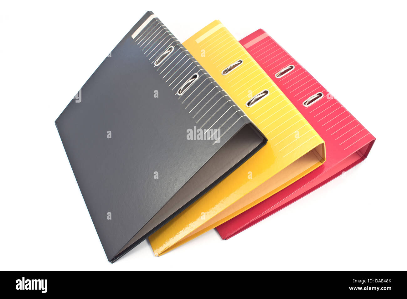 Tre colorate le cartelle di office isolato su bianco Foto Stock