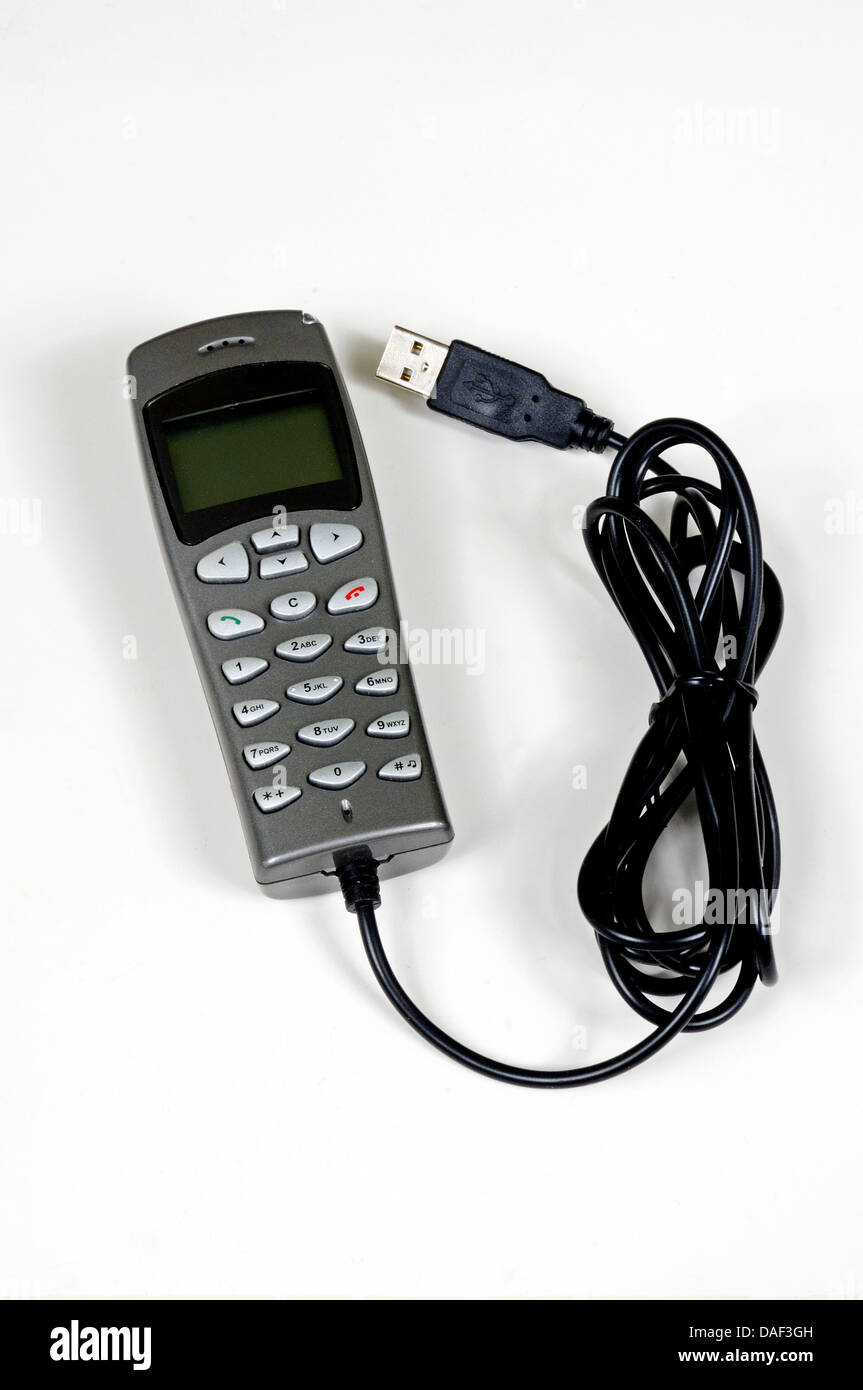Telefono USB (per computer) contro uno sfondo bianco. Foto Stock