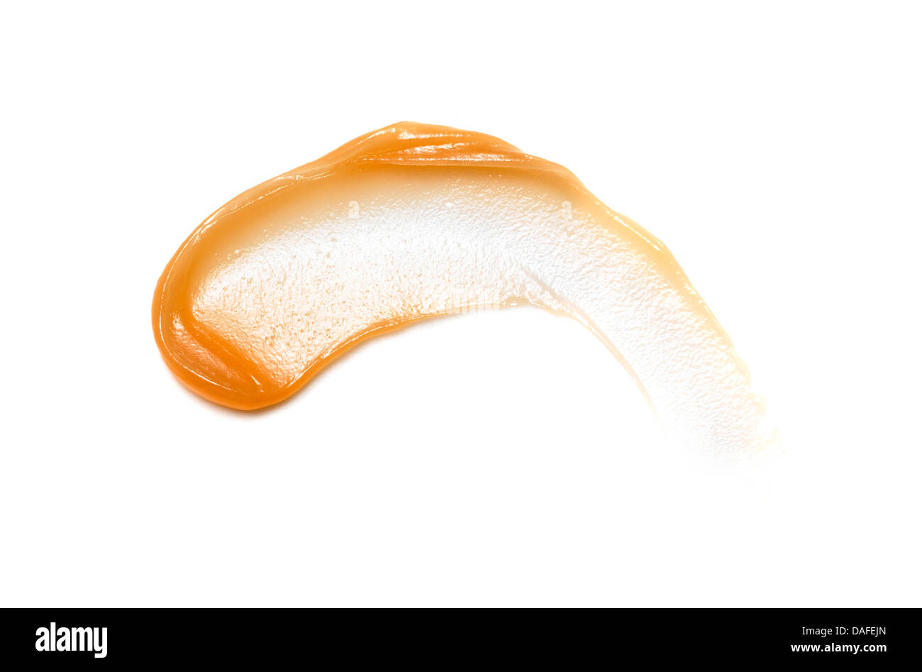 Giallo arancione crema gel olio tagliare su sfondo bianco Foto Stock