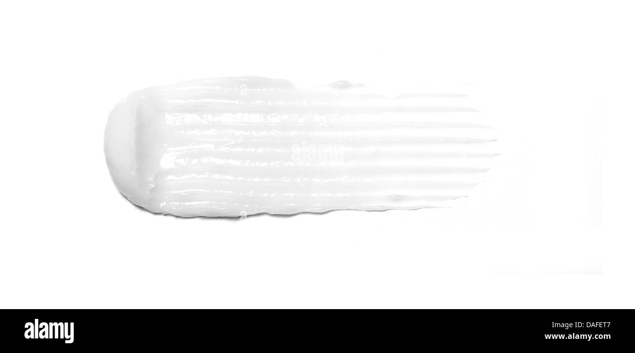 Sweep di bellezza bianco crema gel di olio prodotto tagliato fuori su uno sfondo bianco Foto Stock