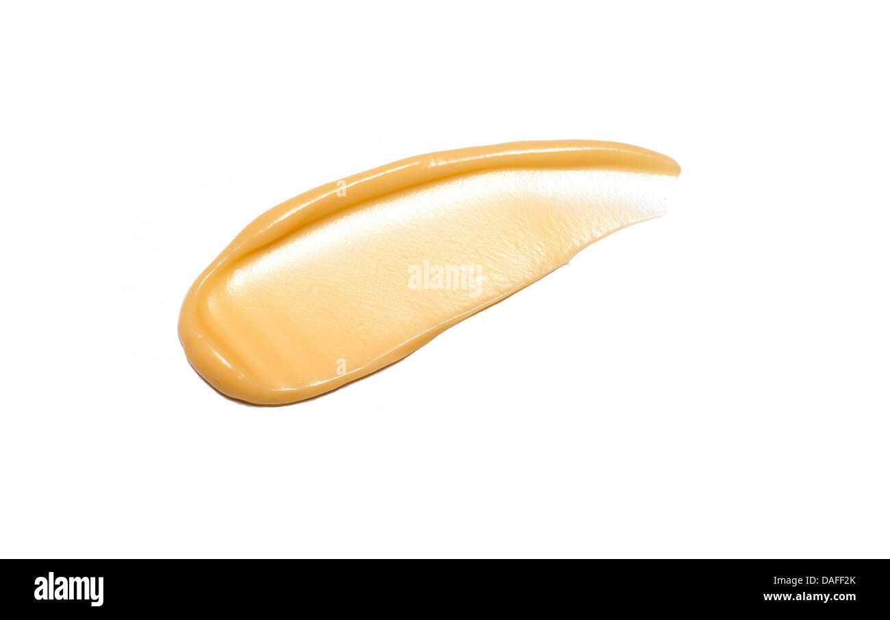 Giallo arancione crema gel olio tagliare su sfondo bianco Foto Stock