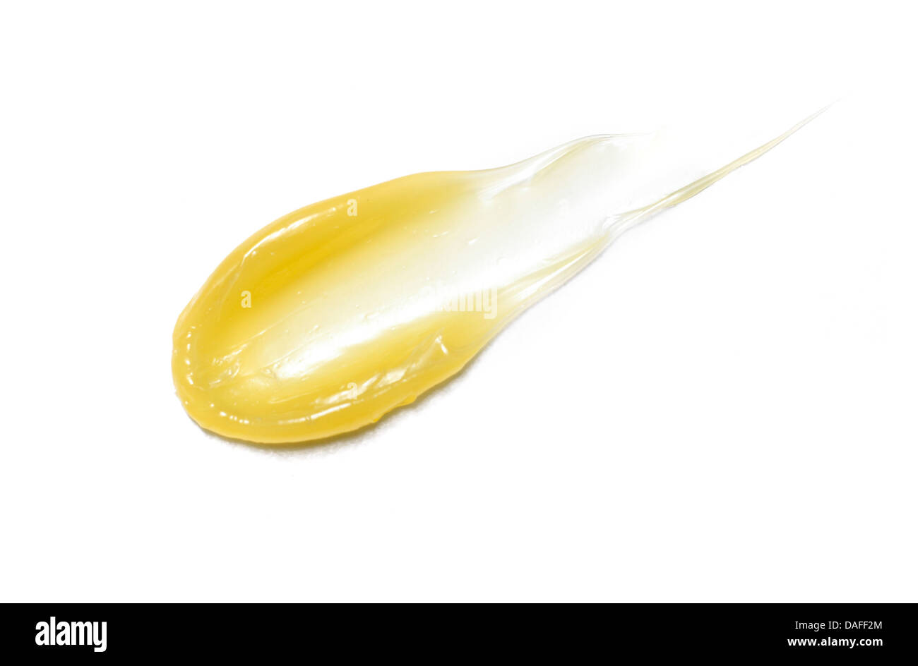 Giallo arancione crema gel olio tagliare su sfondo bianco Foto Stock