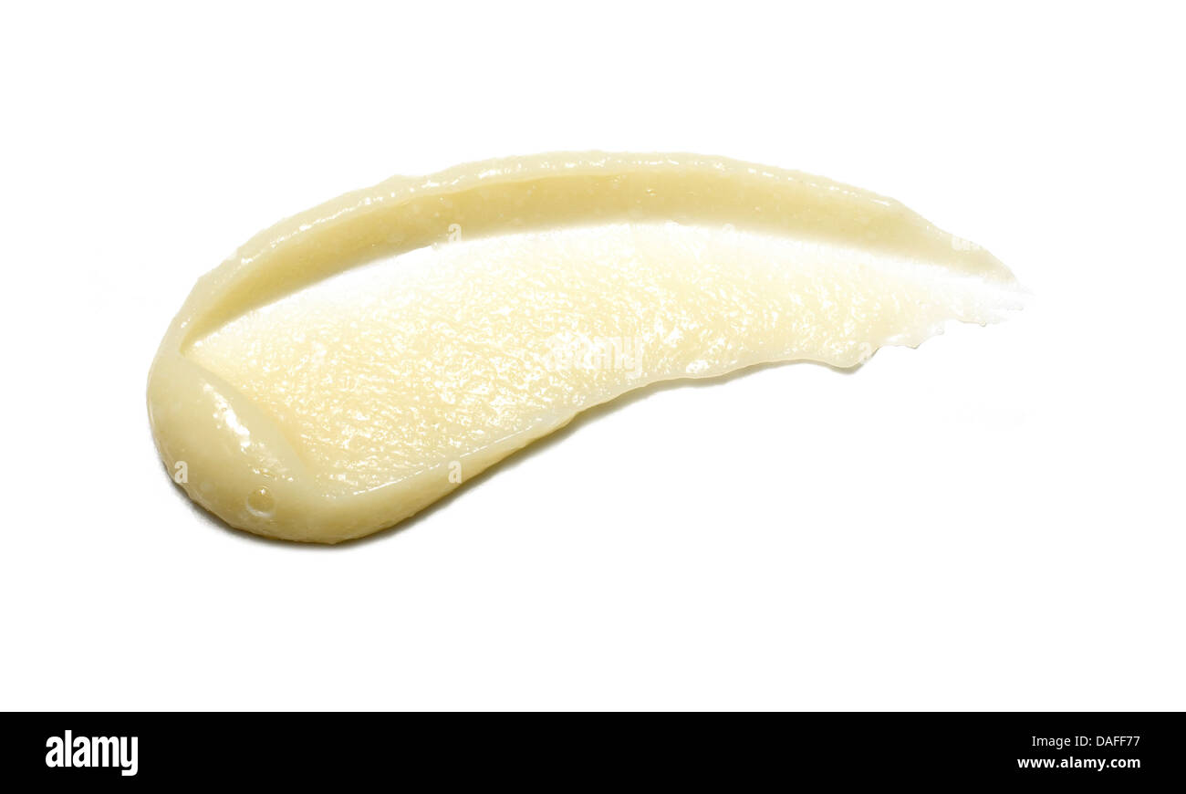 Giallo arancione crema gel olio tagliare su sfondo bianco Foto Stock