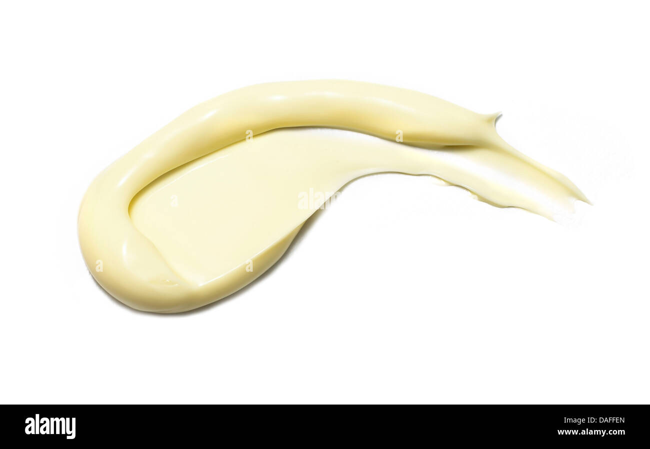 Giallo arancione crema gel olio tagliare su sfondo bianco Foto Stock