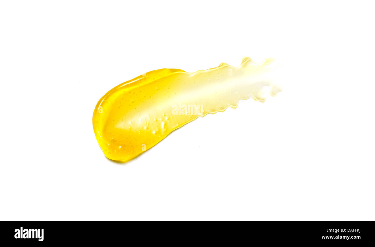 Giallo arancione crema gel olio tagliare su sfondo bianco Foto Stock