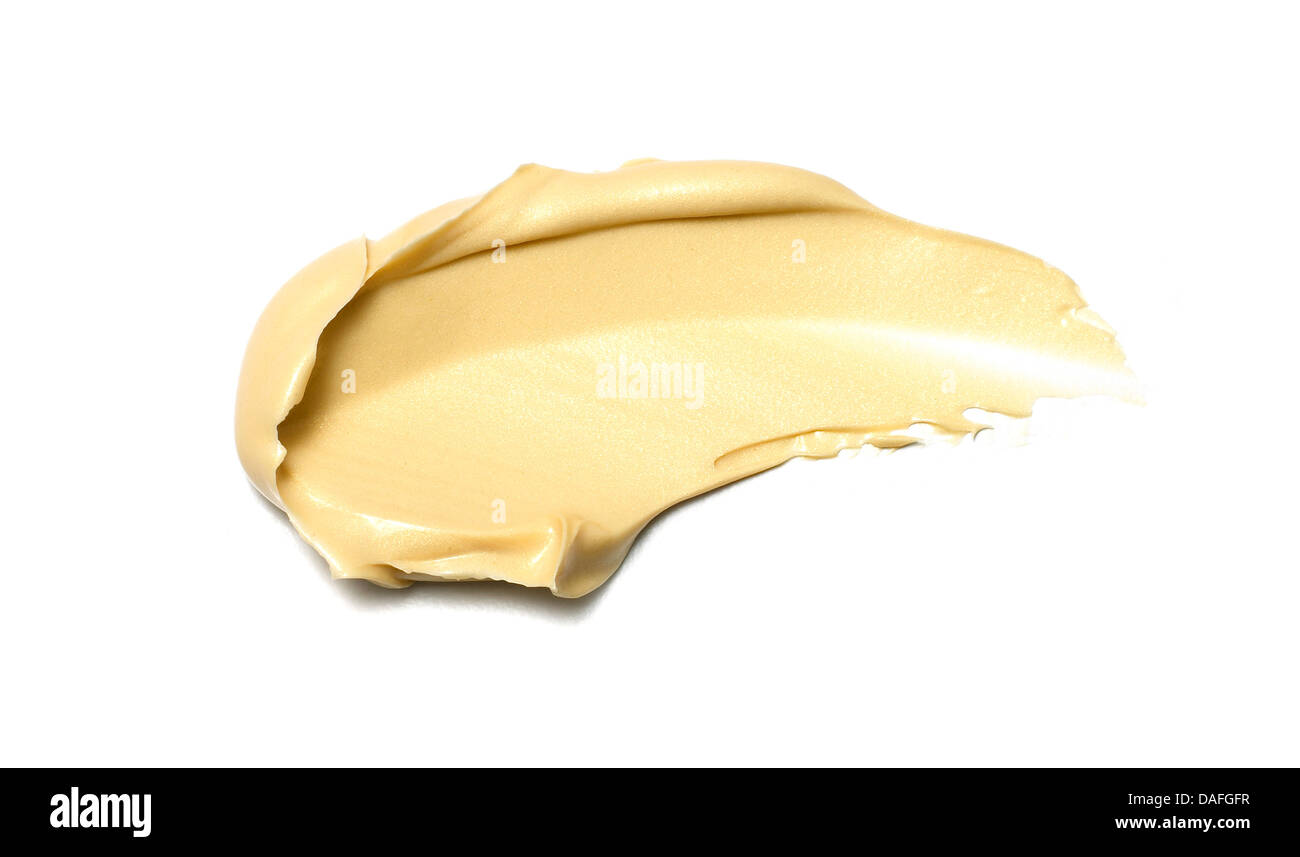 Giallo arancione crema gel olio tagliare su sfondo bianco Foto Stock