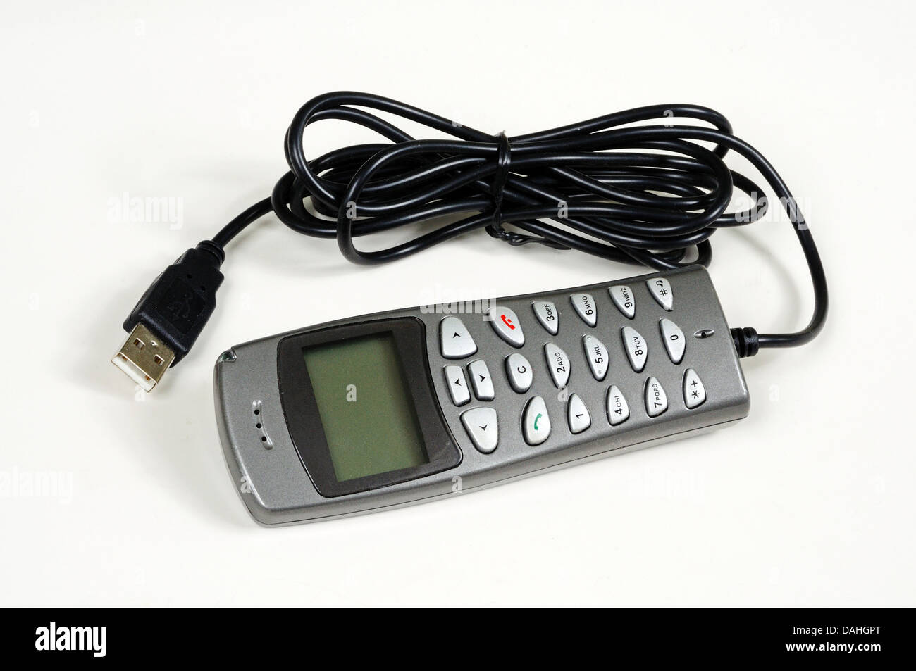 Telefono USB (per computer) contro uno sfondo bianco. Foto Stock