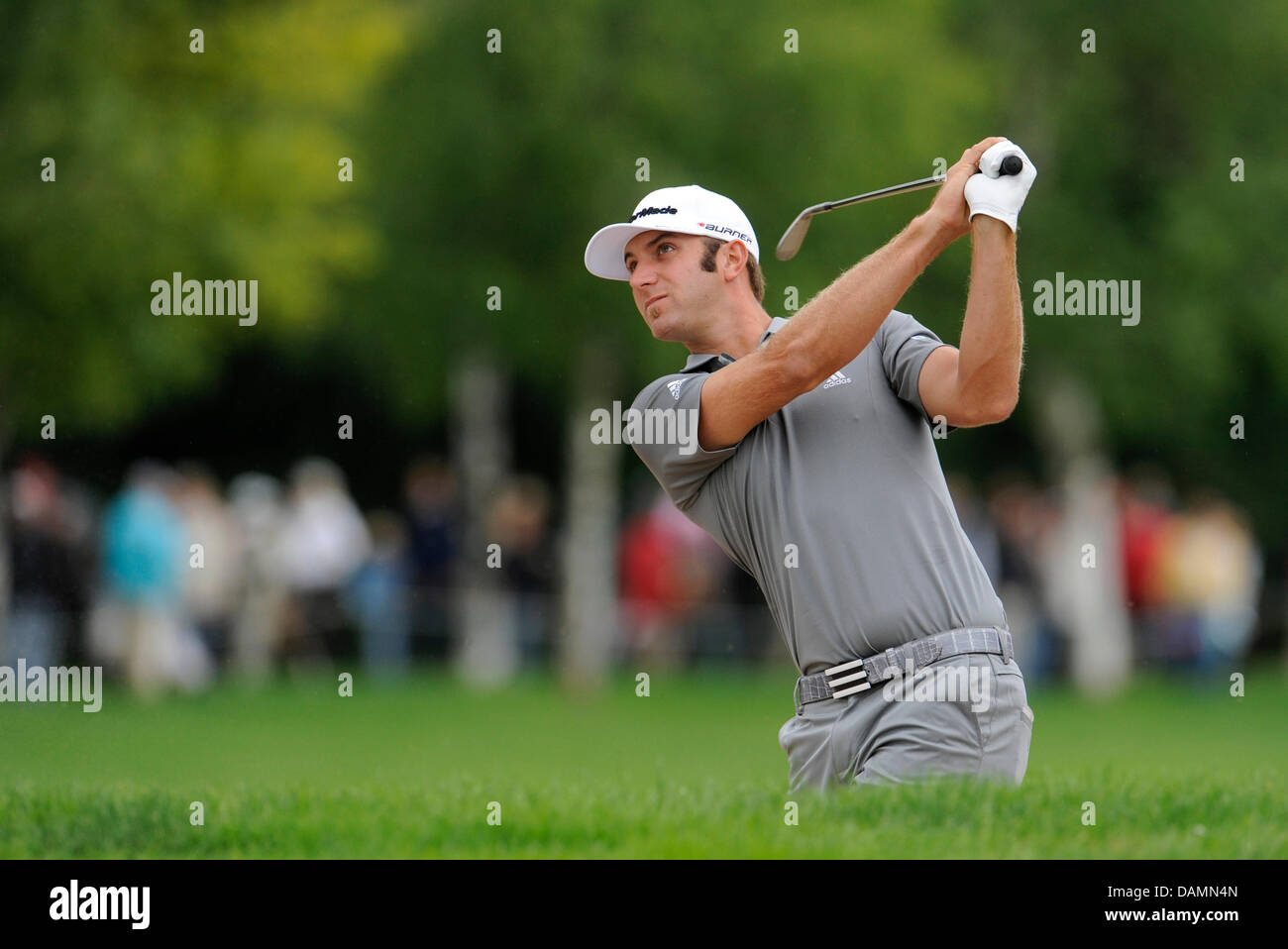 Noi professional golfer Dustin Johnson colpisce la sfera al BMW International Open 2011 in Eichenried vicino a Monaco di Baviera, Germania, 24 giugno 2011. Foto:Andreas Gebert Foto Stock