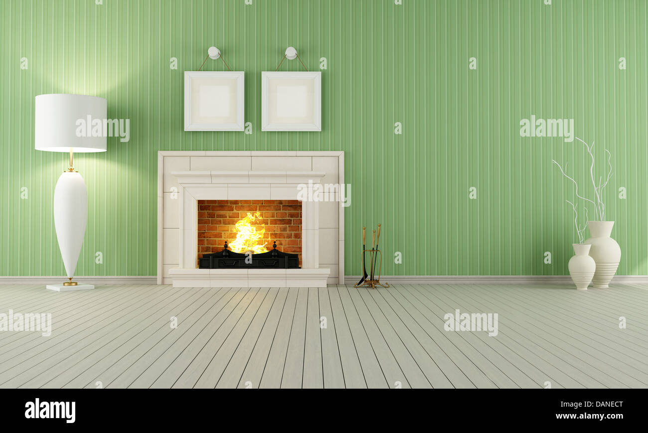 Vintage interno con uno sfondo verde e caminetto classico Foto Stock