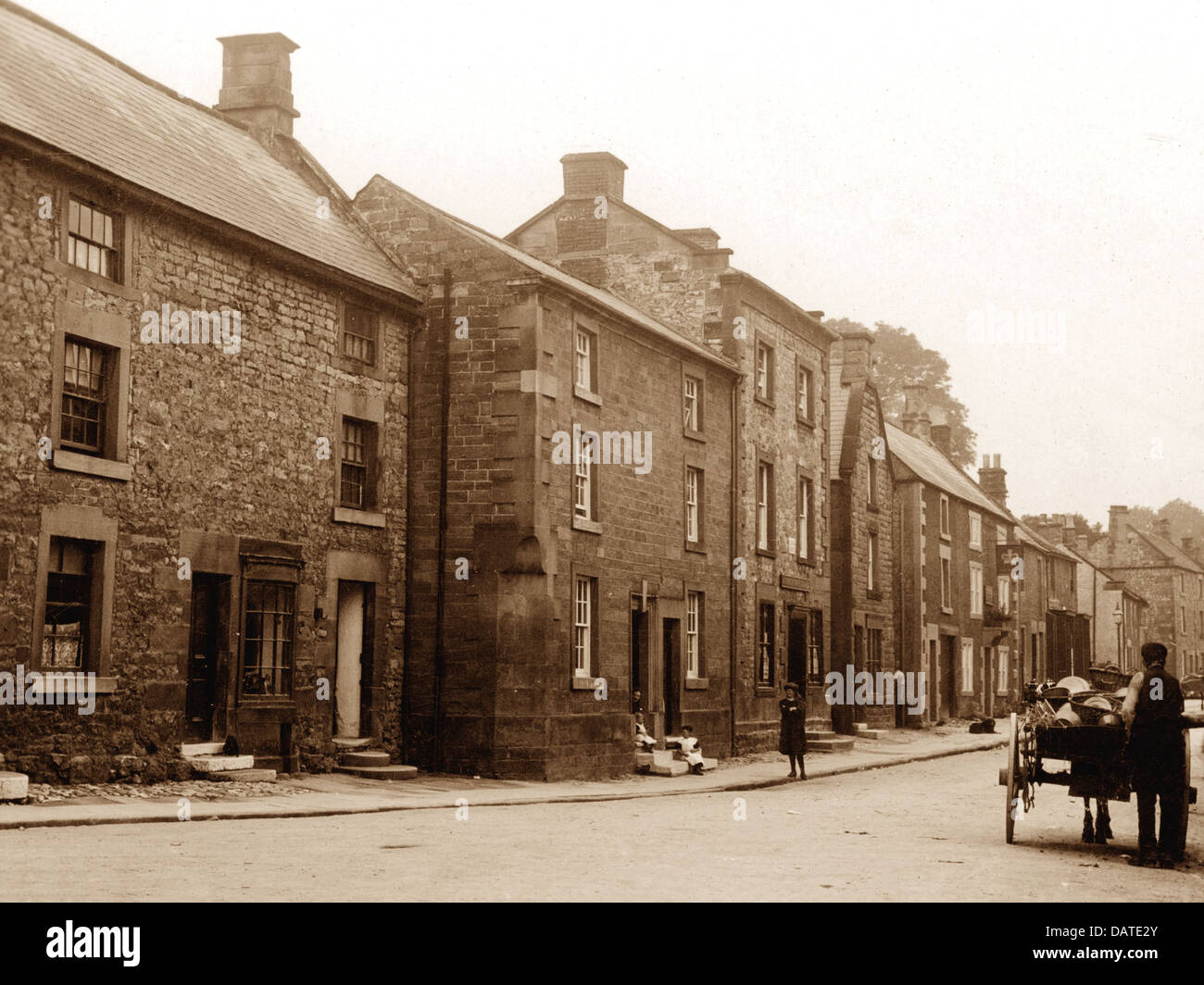 Winster Main Street vicino a Matlock inizio novecento Foto Stock