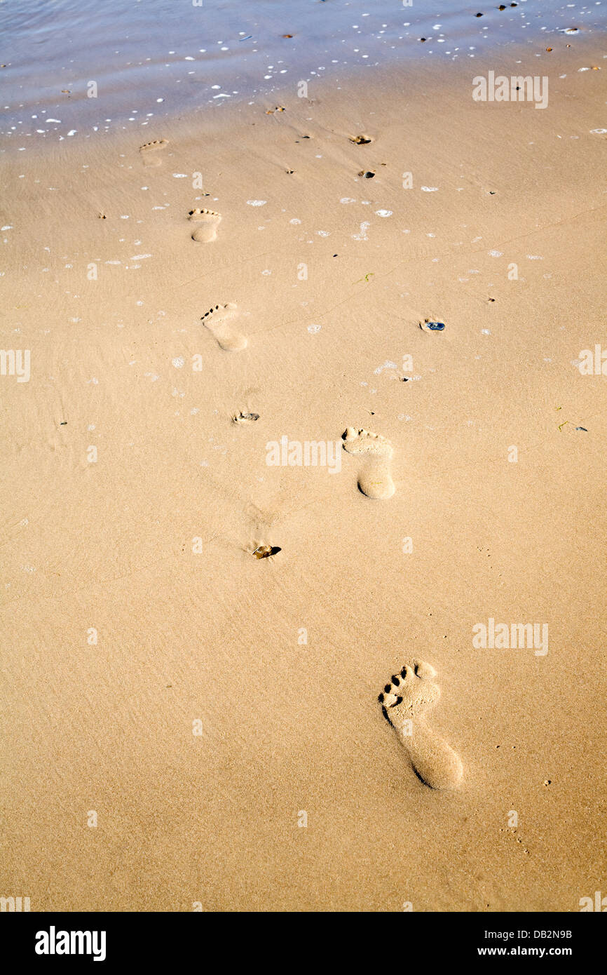 Impronte in spiaggia di sabbia Holkham Norfolk Inghilterra Foto Stock