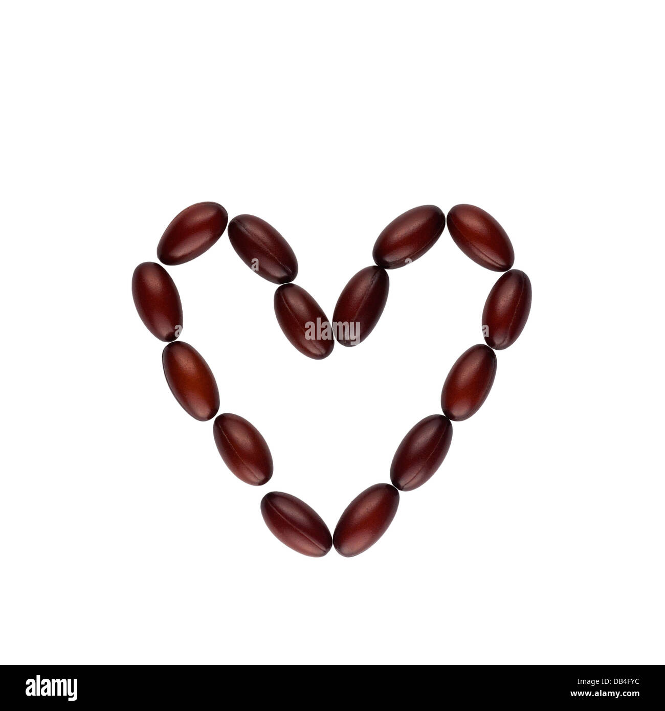 Il coenzima Q10 softgel al capsule a forma di cuore Foto Stock