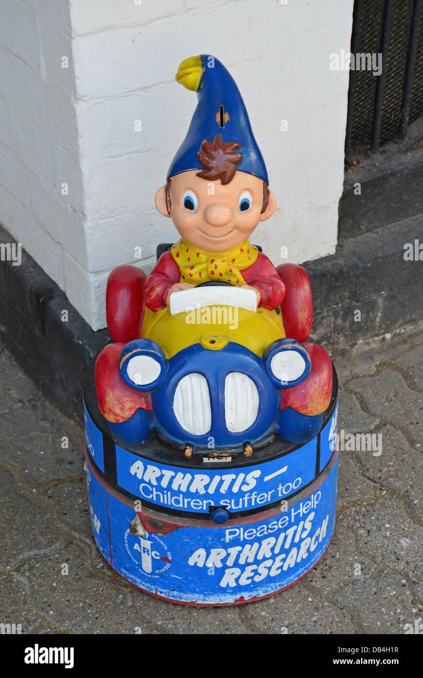 "Noddy' arthritis research carità denaro box, High Street, Ledbury, Herefordshire, England, Regno Unito Foto Stock