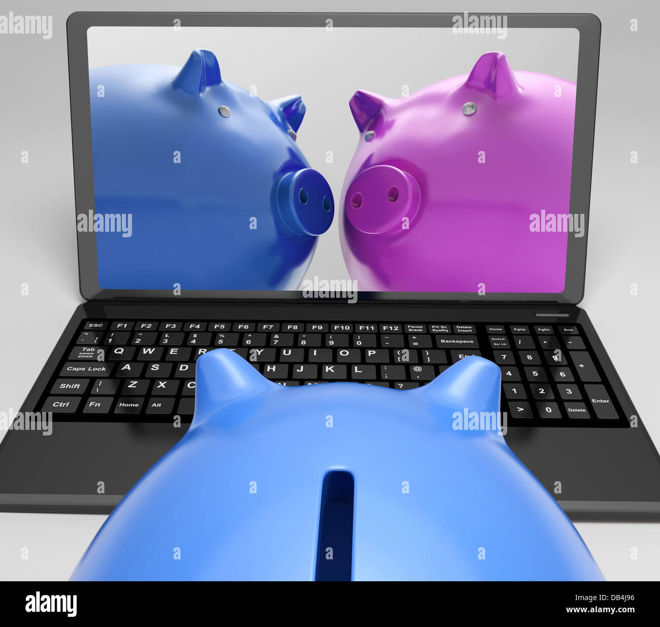 Piggybanks su notebook che mostra le transazioni online Foto Stock