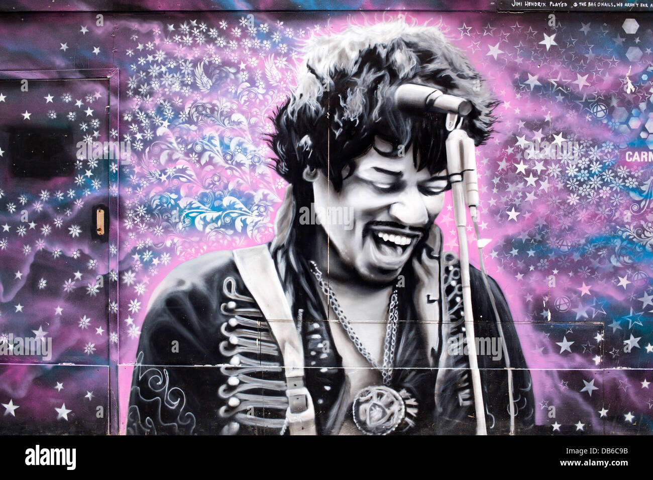 Soho Jimi Hendrix dipinto graffiti sul contenitore di costruzione Foto Stock