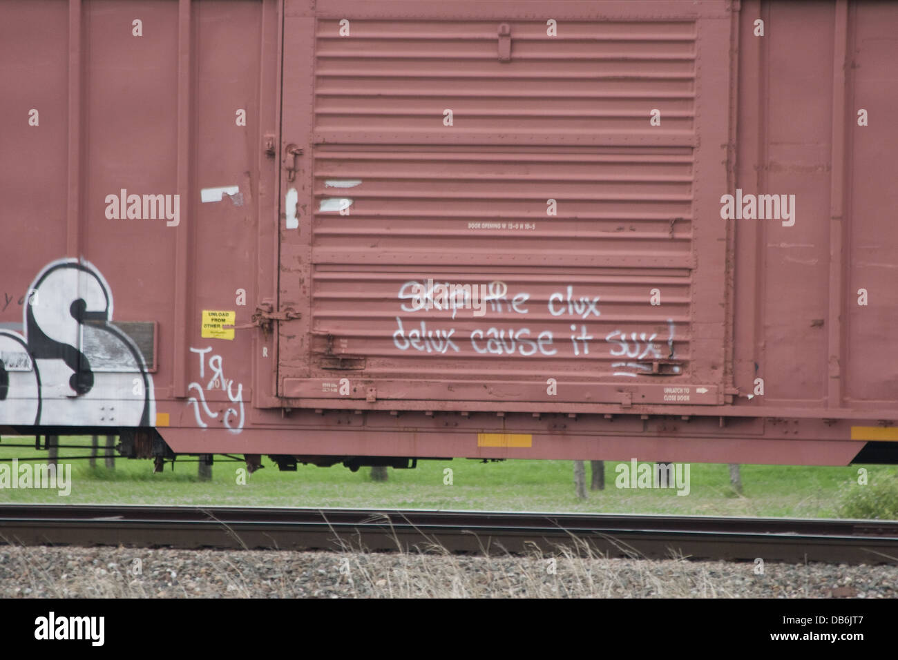 Graffiti sul carro merci in treno merci a Saginaw Texas USA Foto Stock