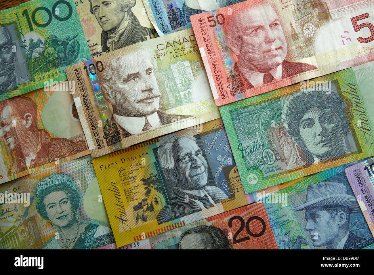 La valuta estera - australiani, canadesi, statunitensi e dollari neozelandesi Foto Stock