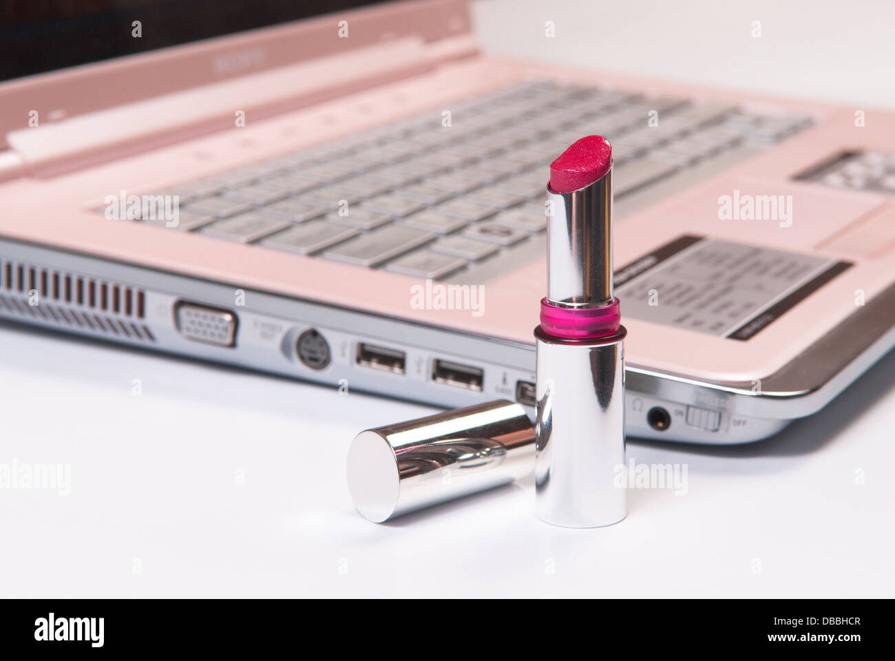 Il computer e il rossetto Foto Stock