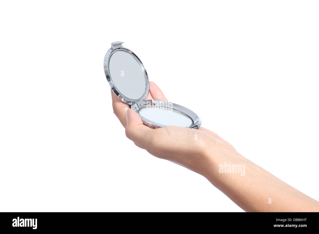 Donna mano che tiene una mano specchio isolato su uno sfondo bianco Foto Stock