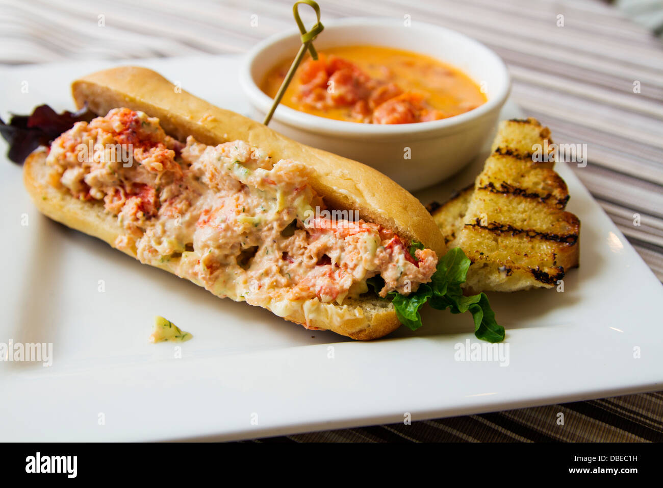 Piatto di deliziosa casa del capo Lobster Roll e infuria la Chowder Foto Stock