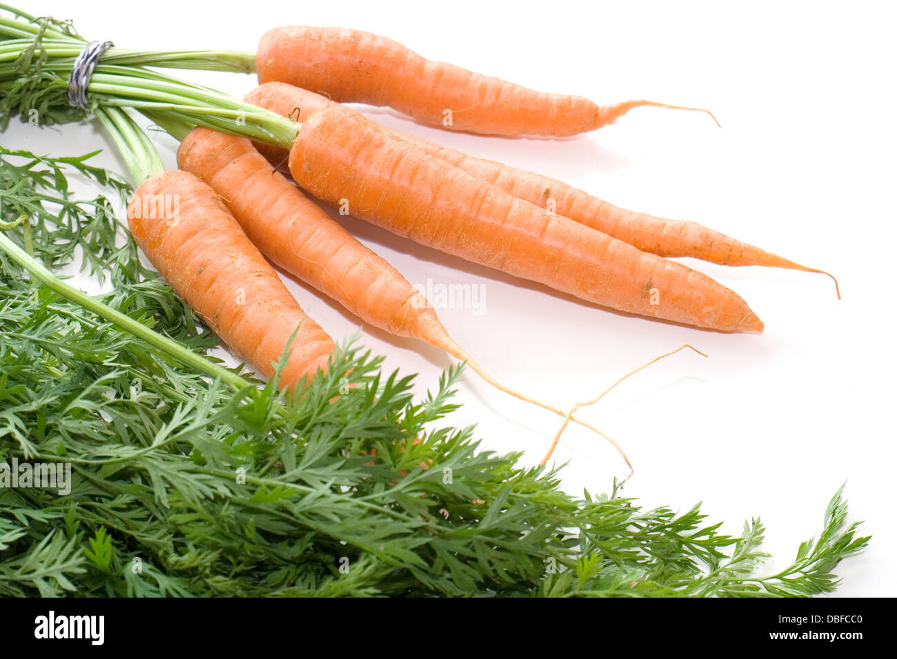 Le carote su sfondo bianco 005 Foto Stock
