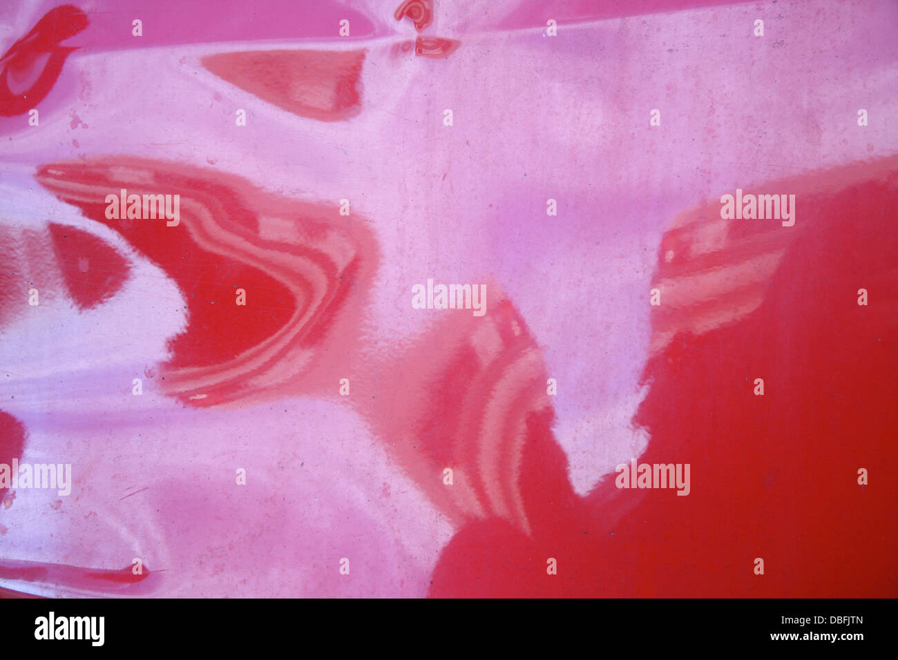 La riflessione della luce sulla vernice dell'auto Foto Stock