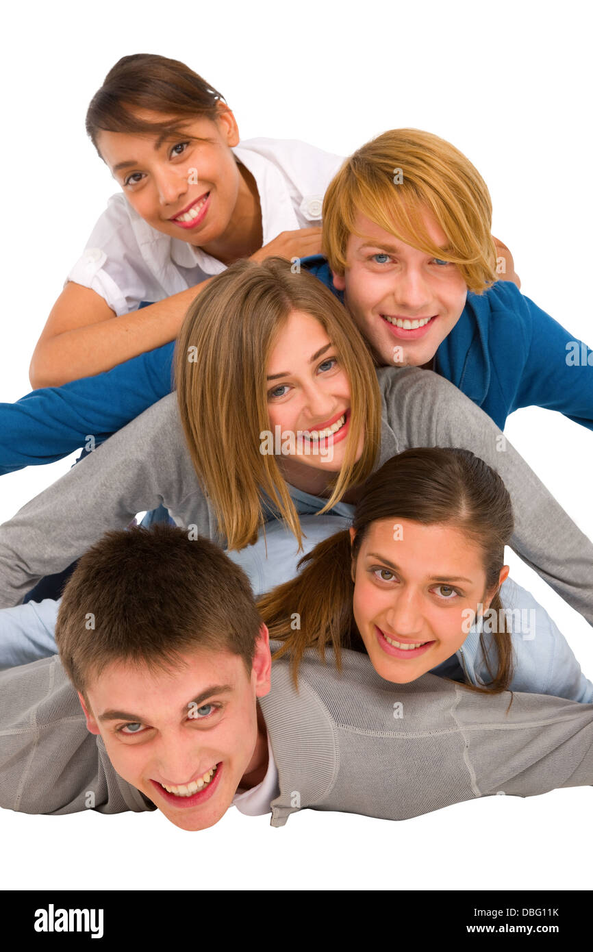 Gli adolescenti che stabilisce in pila Foto Stock