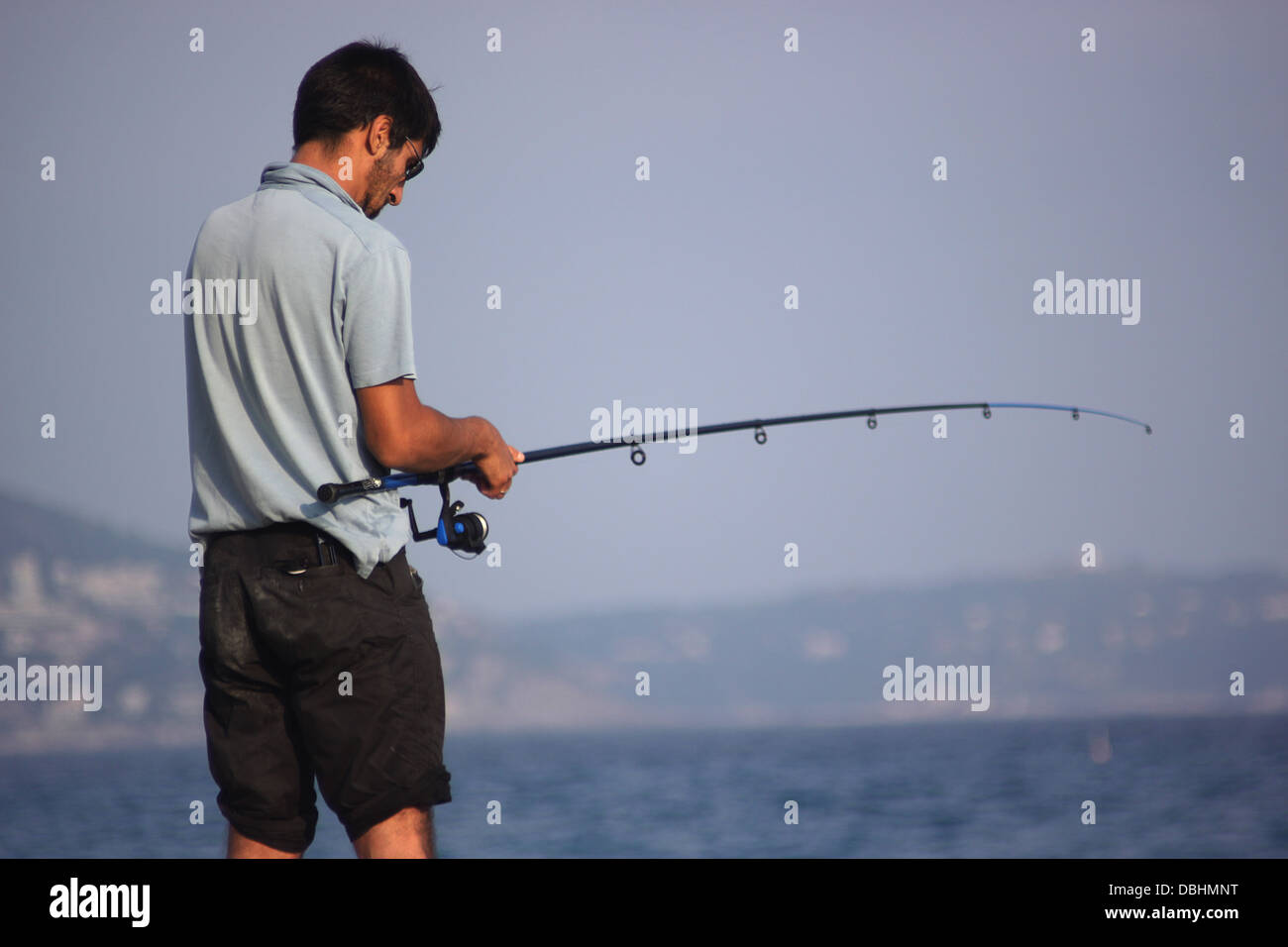 Pesca dell'uomo. Foto Stock